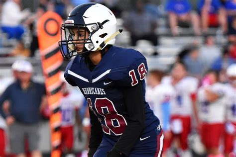 esther breitling|Homecoming queen plays football .